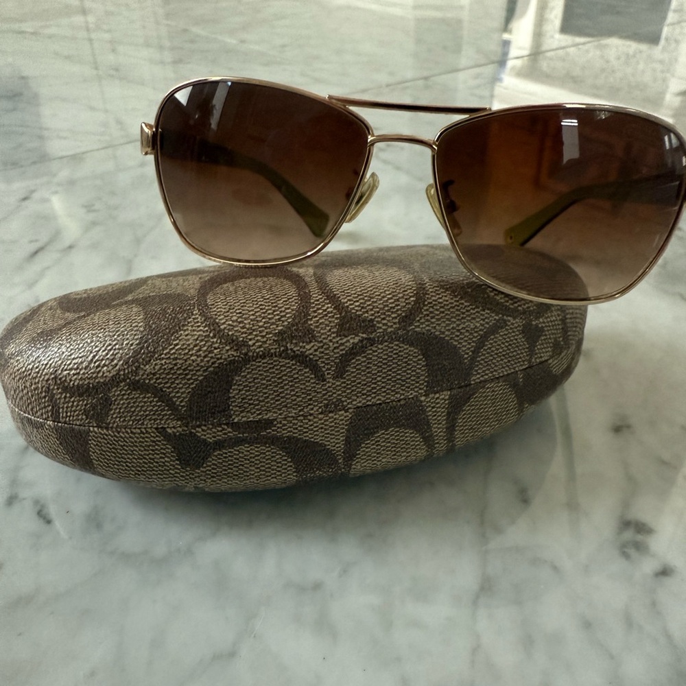 Coach women’s sunglasses and case